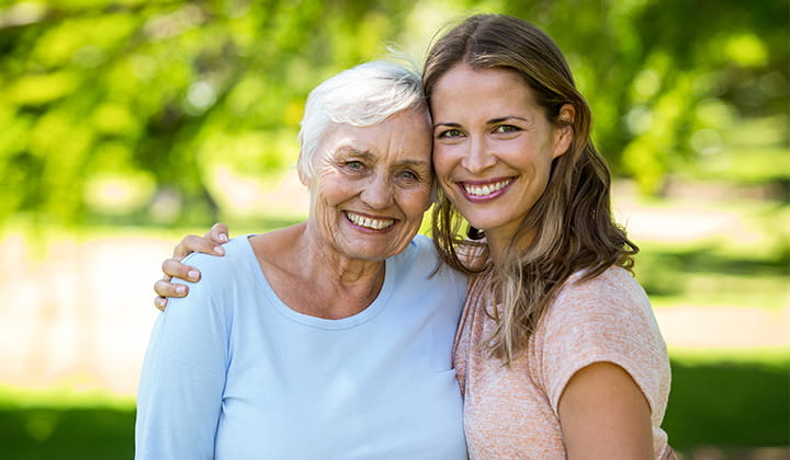Smiling mom and daughter.