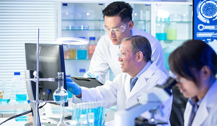 Researchers in lab